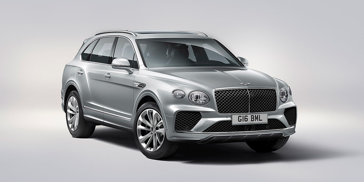 Bentley Beijing-Yizhuang Bentley Bentayga in Moonbeam paint, front three-quarter view, featuring a matrix grille and elliptical LED headlights.